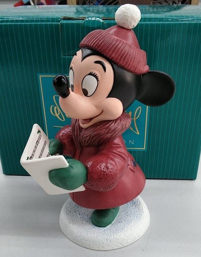 Disney store caroler minnie - disney,