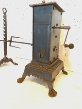 tourne broche anciens en fonte