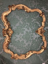 Grand dessus de cheminée, miroir de boiserie. En bois sculpté et doré, XVIIIe