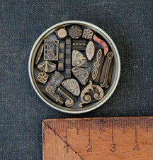 Lot de fers à dorer plaque