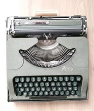 Machine à écrire de voyage ancienne ROOY