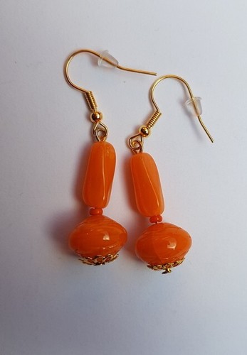 Boucles oreilles avec des - boucles, d'oreilles