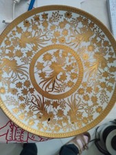 2 assiettes décoratives en porcelaine fine,decor doré a l or fin