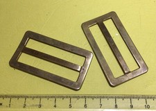 MERCERIE MILITAIRE - paire de boucles de réglage de brelage militaire