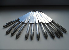 12 couteaux en  métal