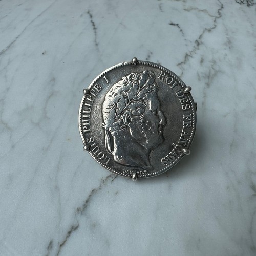 Broche argent pièce de - en,
