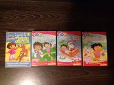 Lot de 4 DVD Dora - Très bon état