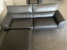 canapé cuir 3 places + pouf carré assorti Roche Bobois