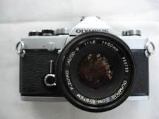 Olympus OM 1n chromé + 50mm f1,8 Zuiko. Très bon état, bon fonctionnement