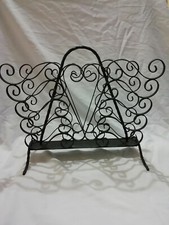 porte revue en fer forgé. H. 37 cm . XXéme