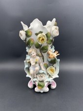 Vase Rococo en porcelaine XIXe siècle Antique porcelain vase cherub
