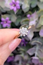 Bague solitaire en 2 ors centrée d'un diamant demie taille d'environ 0,3ct Or 7