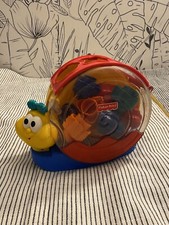 Lot de 4 jouets contenant de