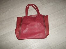 Sac à main simili cuir bordeaux et zipps dorées TBE