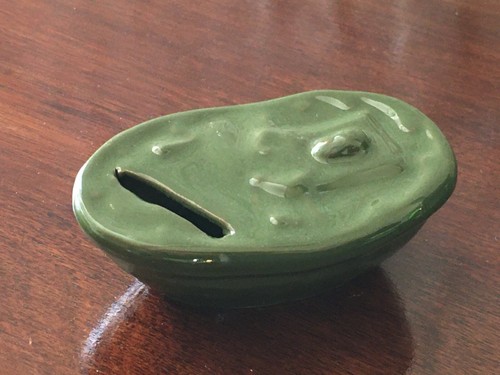 Ceramic breaking piggy bank - breaking,