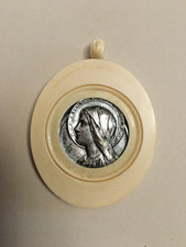 Médaille de berceau art deco