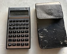 HP 17bII+ calculatrice financière avec étui cuir noir Fonctionnelle Tbe