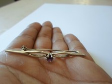 broche en argent massif, ajourée, cabochon d'améthyste