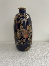 Ancien vase faience signé