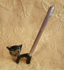 Porte stylo en bronze forme