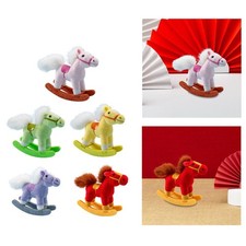 Cheval à bascule en peluche