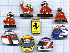 Lot de Pin's Ferrari / MARLBORO PROST SENNA BERGER ALESI casques logo automobile