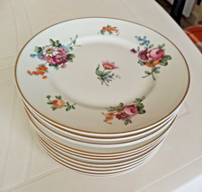 12 assiettes  en porcelaine  Bernaudeau Limoges  18,5 cm  motif floral Sou