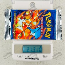 21.310g HEAVY Charizard art ! Pokemon Base Set Booster Pack TCG 4th print UK ...