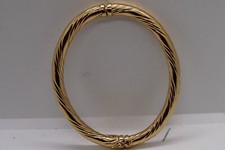 bracelet jonc ouvrant or jaune 18 carats 750 dans le gout Hermes Boucheron