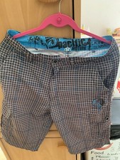 bermuda polyester noir & carreaux blancs et bleus Taille M marque Pacific Motion
