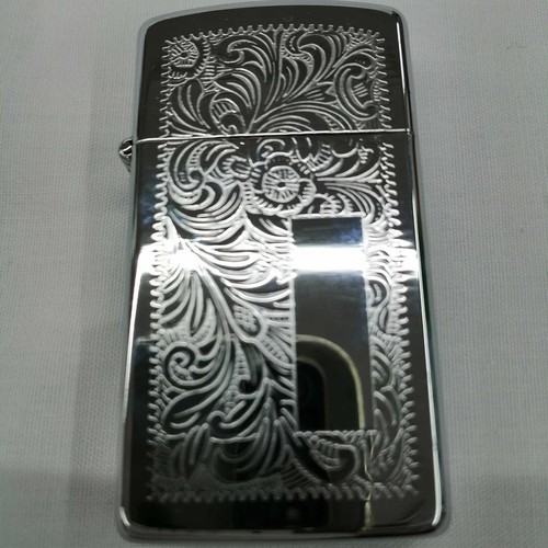 Briquet huile zippo - à,