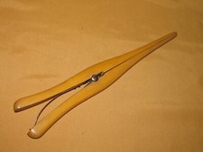 Ancienne pince à gants en bois objet outil ancien collection gantier