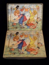 Ancien jouet puzzle bois jeux enfants poupée Golli lessiveuse années 1930/40