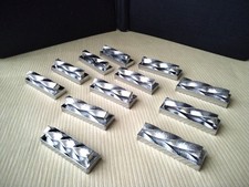 12 porte couteaux en métal couleur argent    NOUVEAU