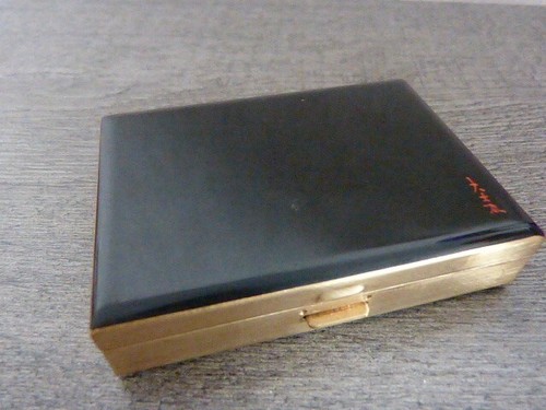 Poudrier minaudière en - ,,