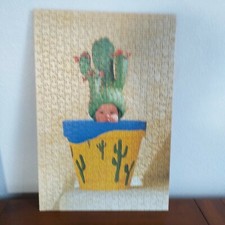 Tableau puzzle photo Bébé Cactus ANNE GEDDES collé sur bois avec attache 