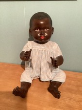 poupée noire , poupon