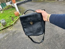 Sacoche vintage en cuir noir avec poignée et bandoulière