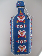 Gourde mexicaine années 60 bouteille en verre dans étui en peau décor vintage.