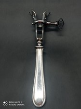 Pince Poignée Manche à gigot en métal argenté .