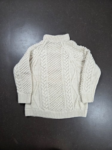 Pull vintage torsadé crème