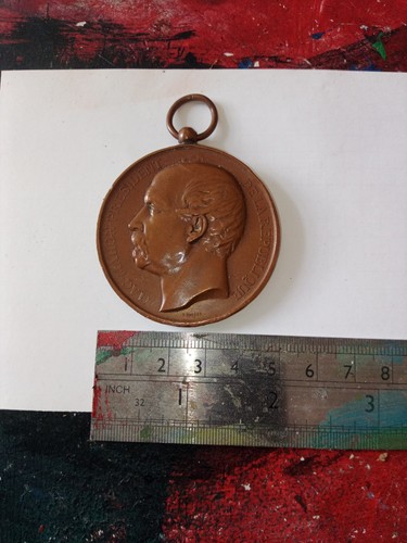 Médaille tir en - de,