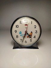 Réveil poule qui picore