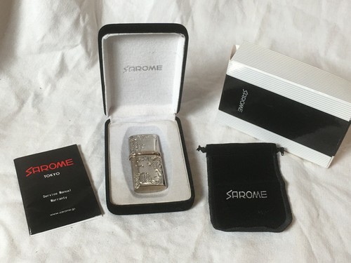 Briquet essence sarome - à,