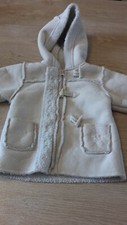 vend manteau bebe fille couleur beige moumouter taille 12 mois