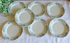 7 ASSIETTES PLATES  FAIENCE KG