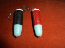 Porte-clés Lot 2 lampes Mme Gilberte WINTER Station SHELL BP 1164 FIANARANTSOA