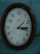 ancienne pendule murale VEDETTE en bois