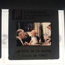 L’AILE OU LA CUISSE - LOUIS DE FUNES , COLUCHE - DIAPOSITIVE DE PRESSE - SLIDE