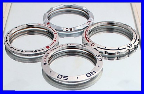 Authentic brand new - bezels, to